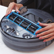 Image for article titled Black+Decker's New Robovac Compresses Dirt Into Garbage Discs That Are Easy to Throw Away